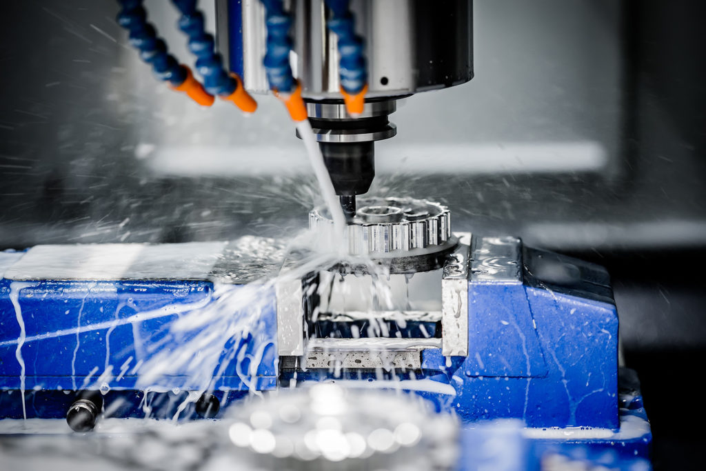 Metalworking CNC milling machine. Cutting metal modern processing technology.