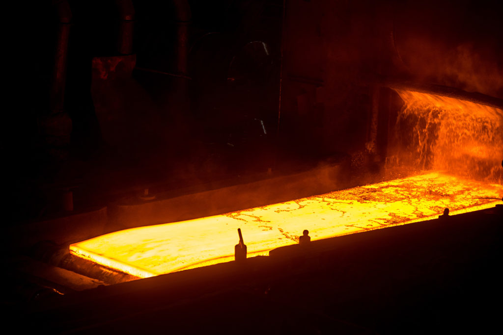 Sheet of hot metal on the conveyor belt